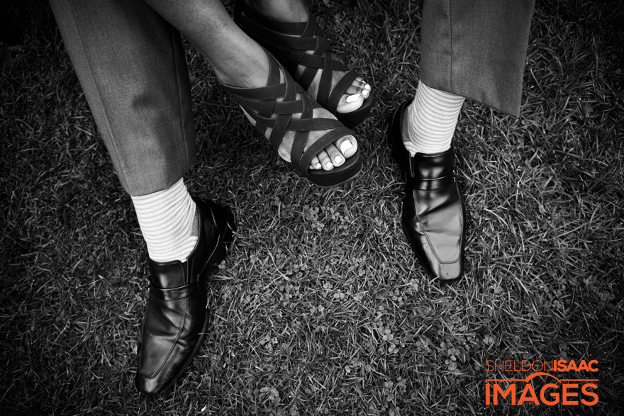 Bride and Groom to be showing their shoes