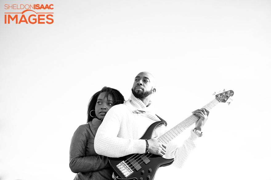 Couple hugging with a guitar