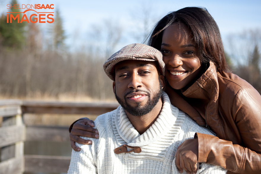 Couple smiling during photo shoot in Aurora