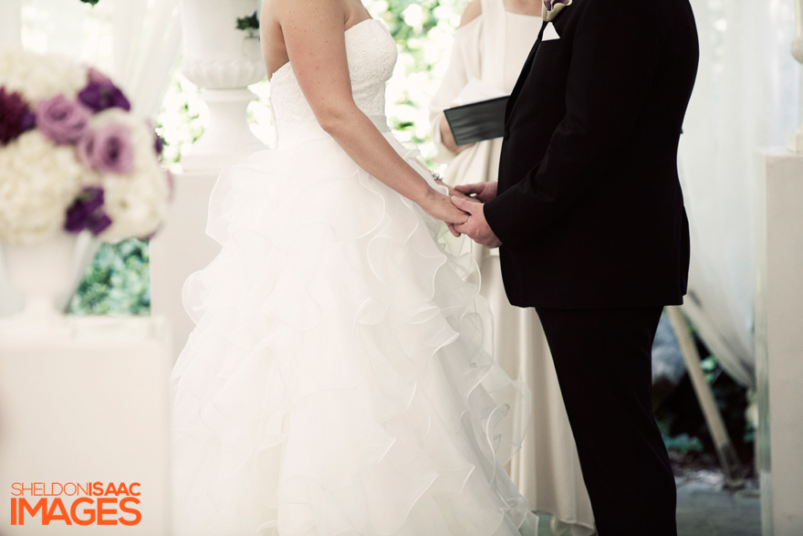 Bride and Groom Holding Hands