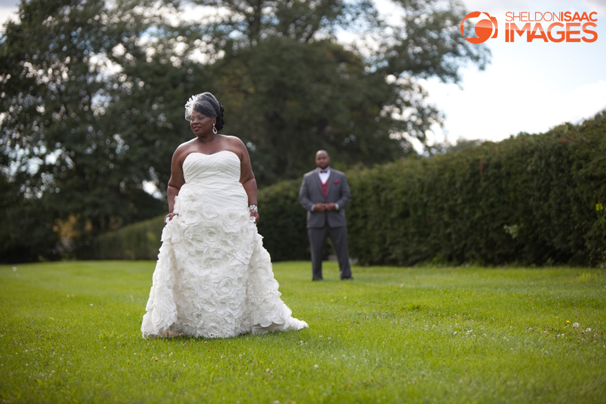 Groom watches his Bride