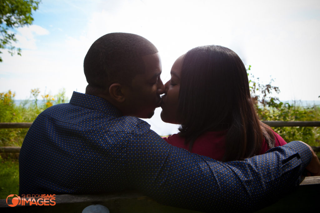 Maternity Photo Husband Wife kissing