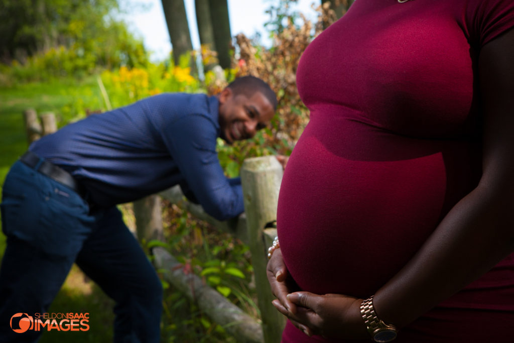 Maternity Photo Husband smiling at pregnant wife