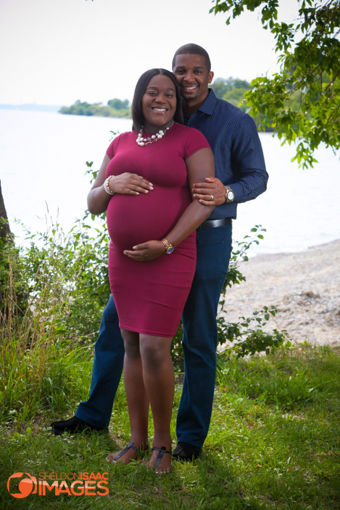 Maternity Photo happy couple hugging