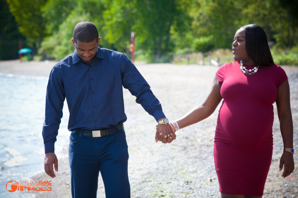 Maternity Photos couple walking on beach