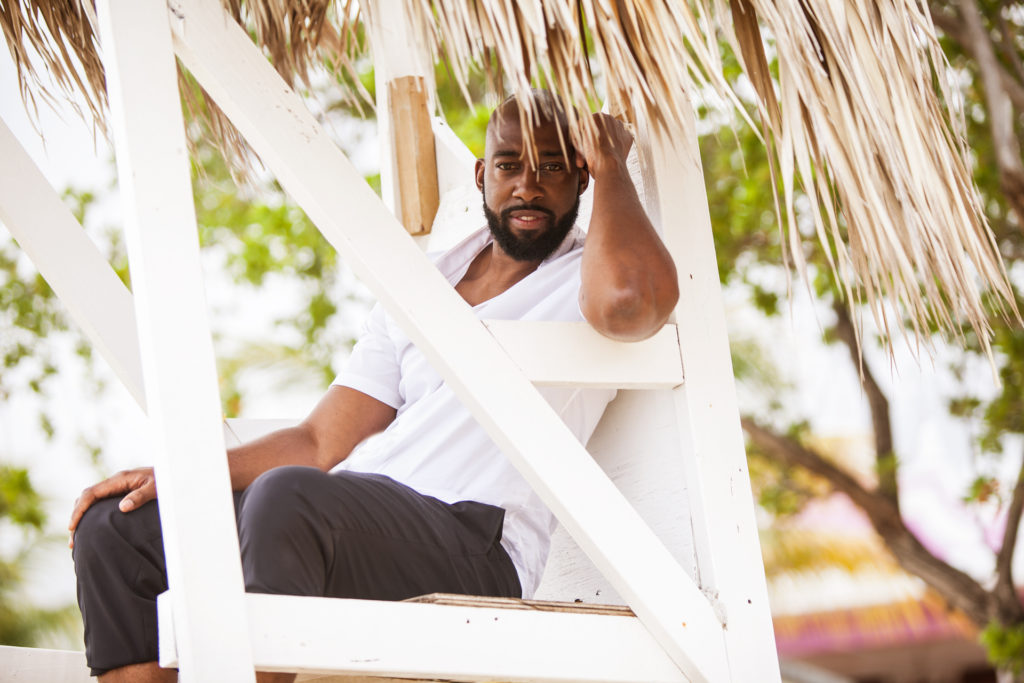 Groom sitting in the Lifeguard's chair