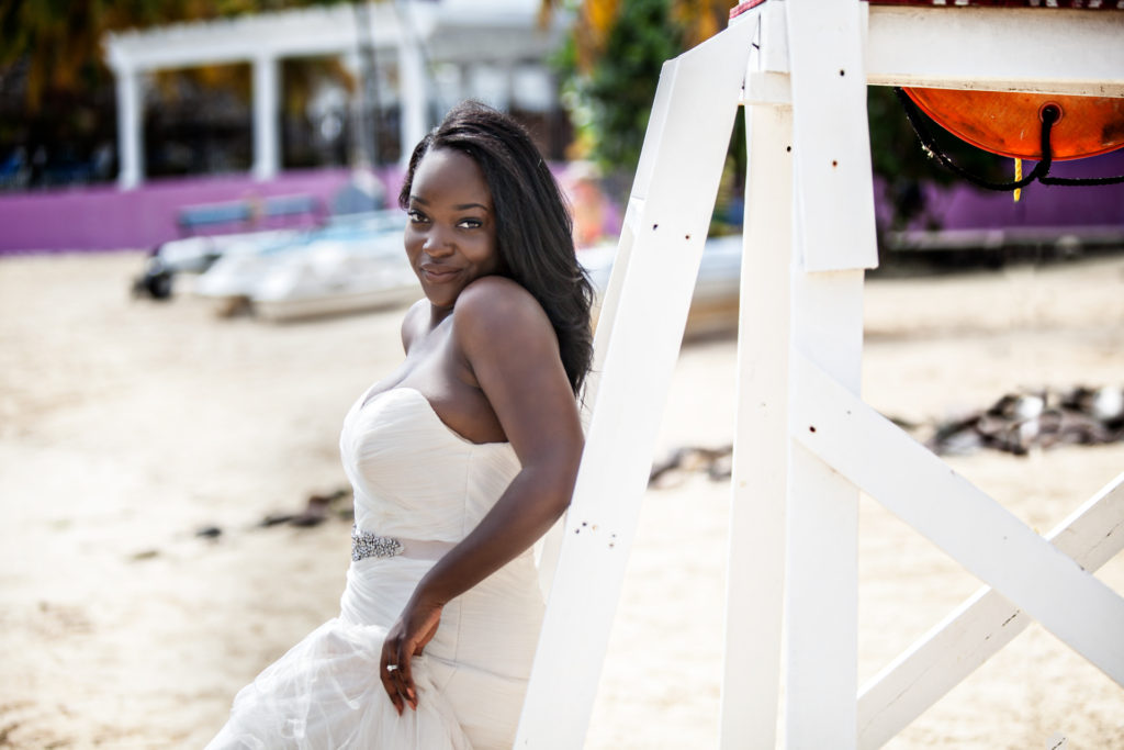 Trash the Dress Shoot Bride Smiling on the beach