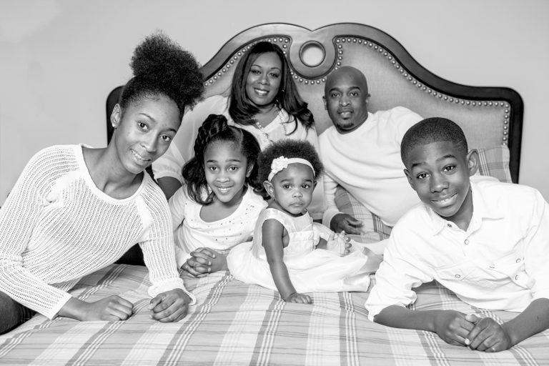 Family photo on the bed in Pickering