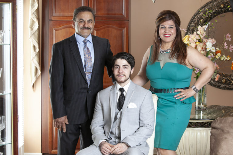 Family smiling on Graduation day in Newmarket