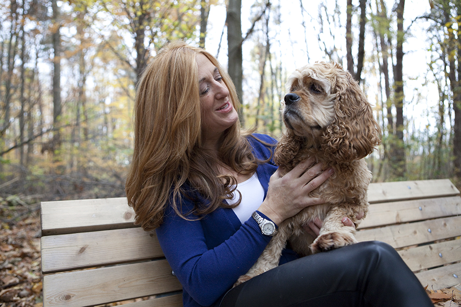 Woman at the park in Pickering with her dog