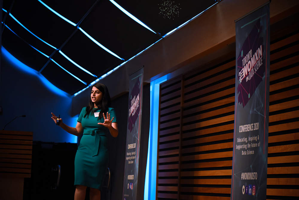 Corporate Conference presenter speaking to a crowd