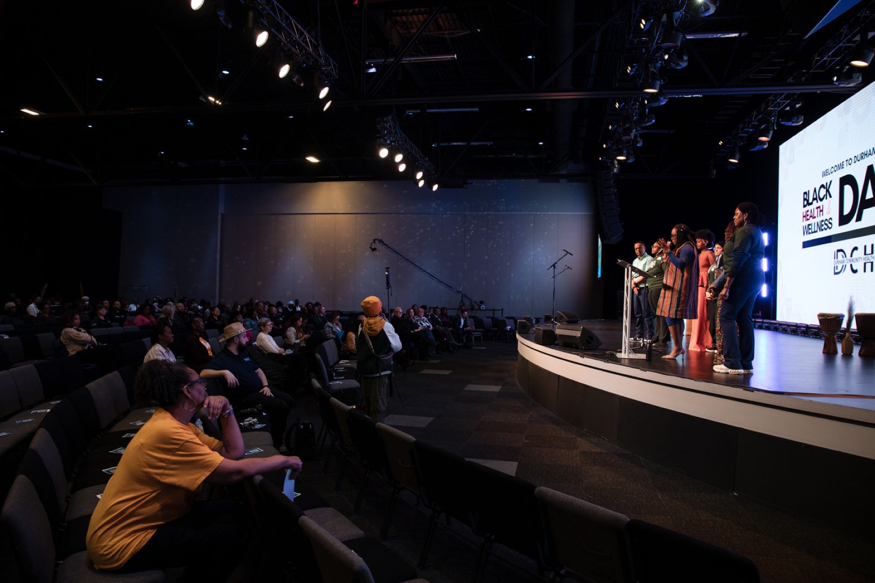 Conference photographer Toronto — keynote address to a full auditorium