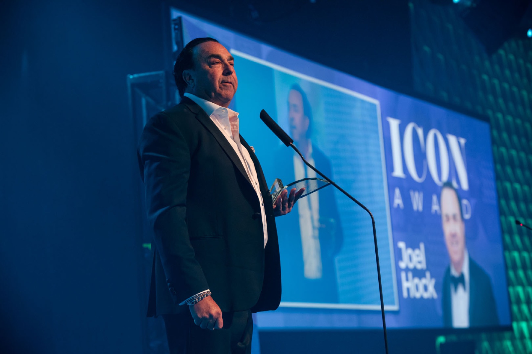 Awards photographer Toronto — honouree accepting an award on stage