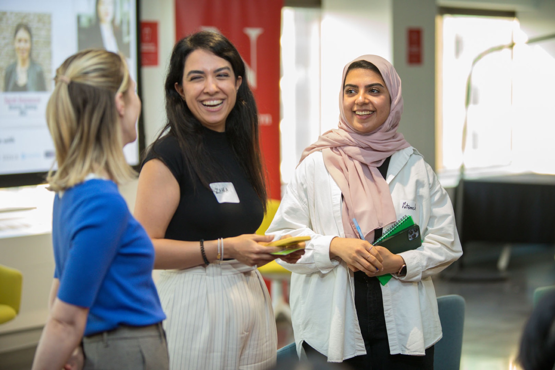 Corporate event photographer Toronto — attendees networking between sessions