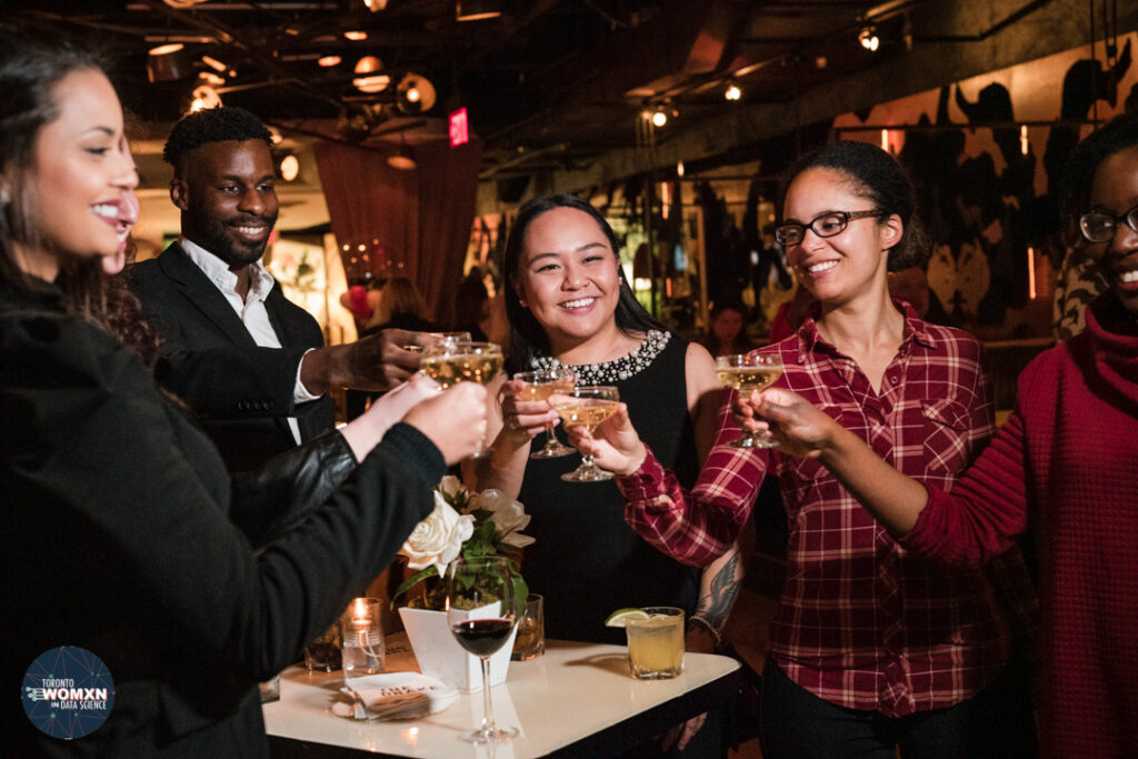 Corporate event photographer Toronto - guests raising a toast at a Toronto awards reception