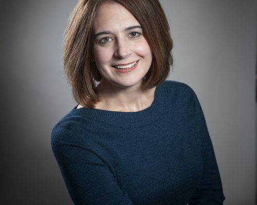 Lady smiling for her headshot in Pickering