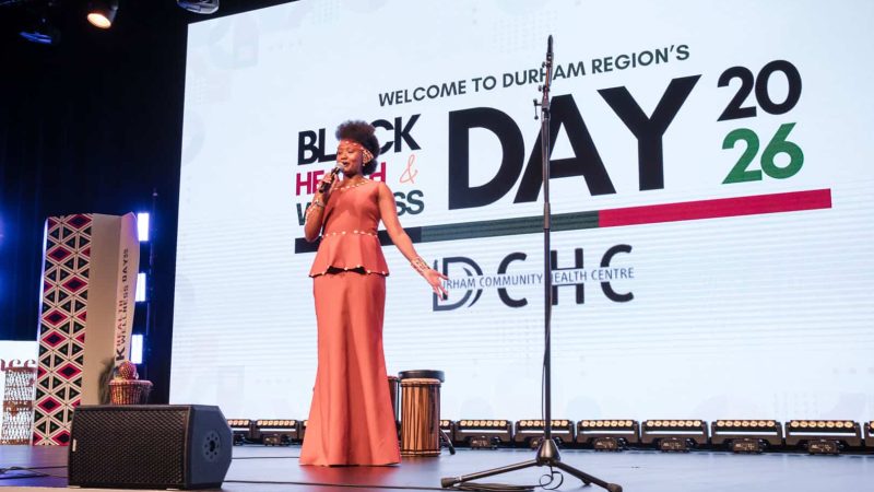 Nonprofit event photographer Toronto - vocalist performing on stage at Durham Regions Black Health and Wellness Day